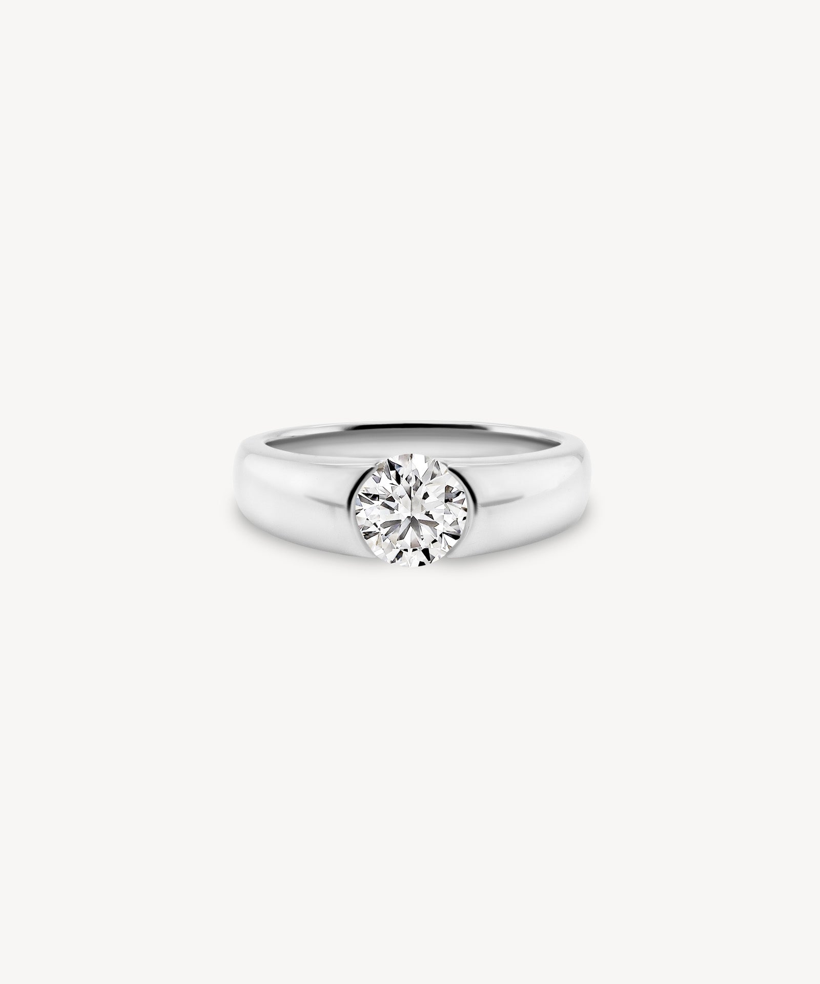 Round Cut Diamond Solitaire Ring in Half Bezel Setting