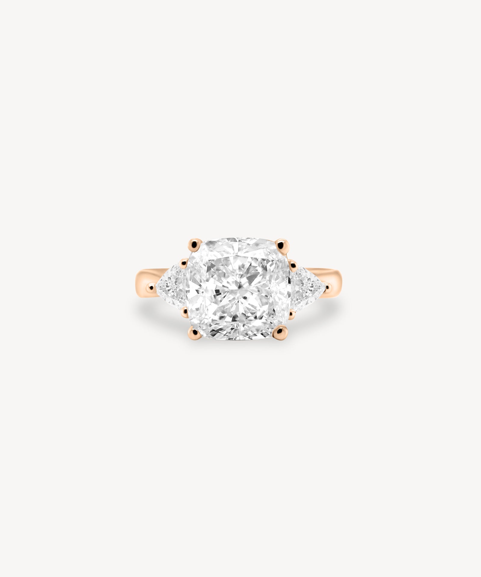 Cushion Cut Diamond Three Stone Ring With Trillion Cut Side Stones