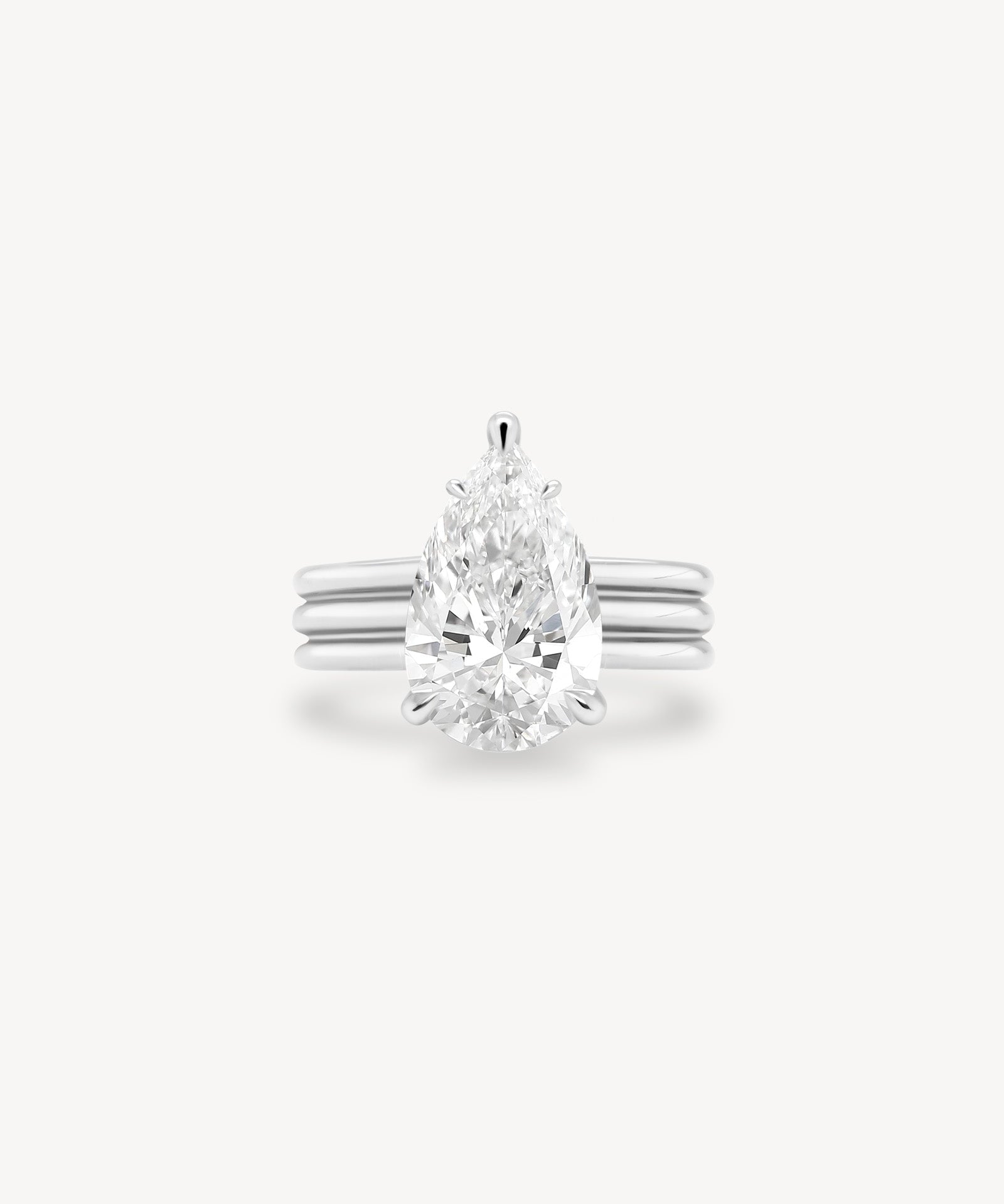 Pear Cut Diamond Triple-Ribbed Solitaire Ring