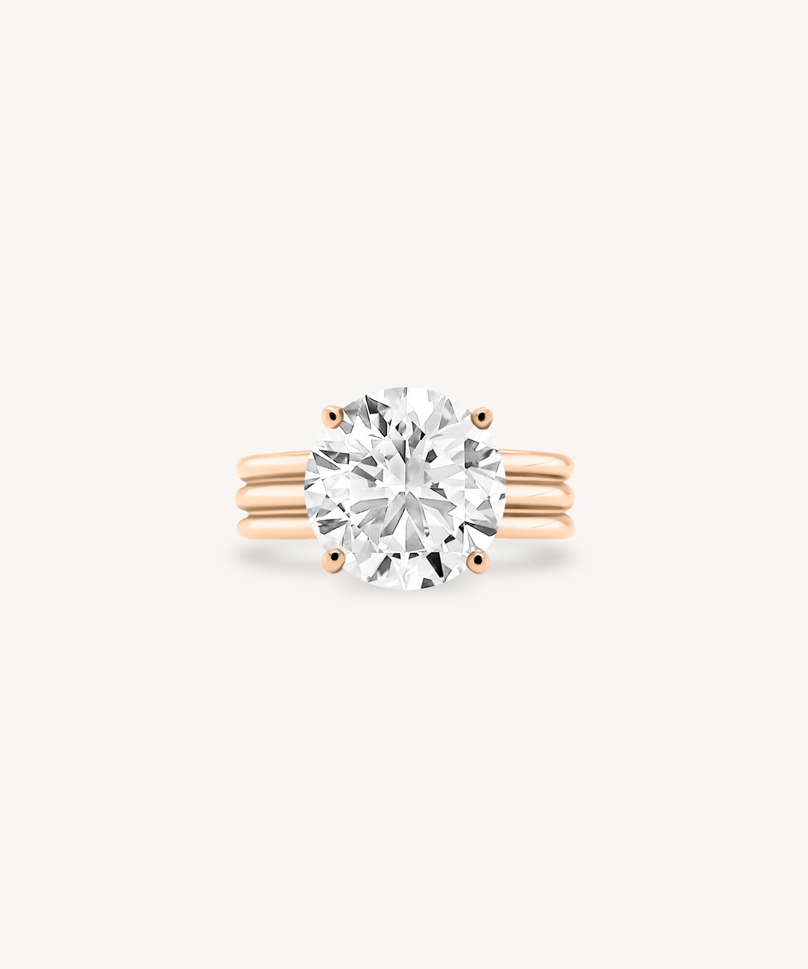 Round Cut Diamond Triple-Ribbed Solitaire Ring
