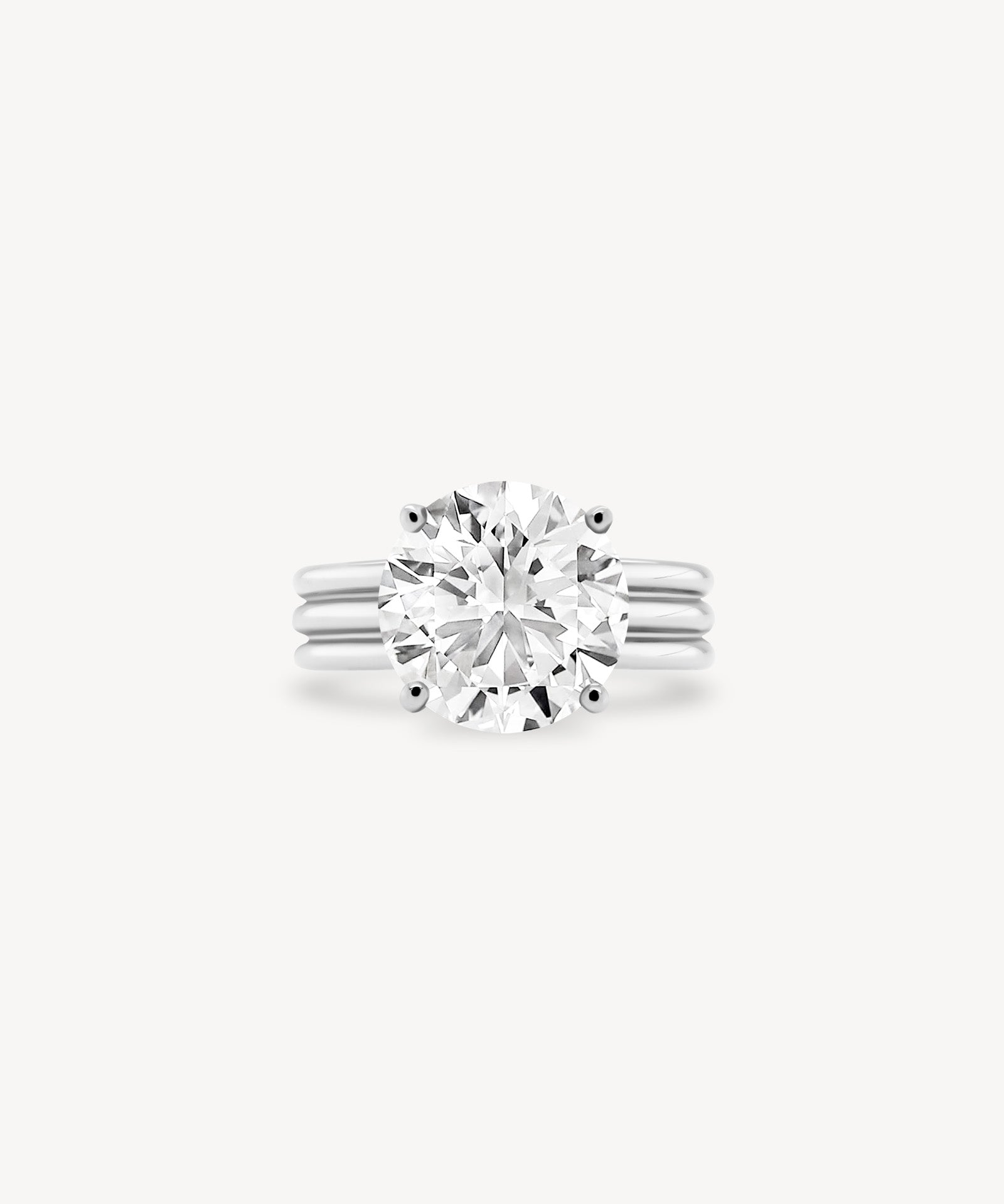 Round Cut Diamond Triple-Ribbed Solitaire Ring