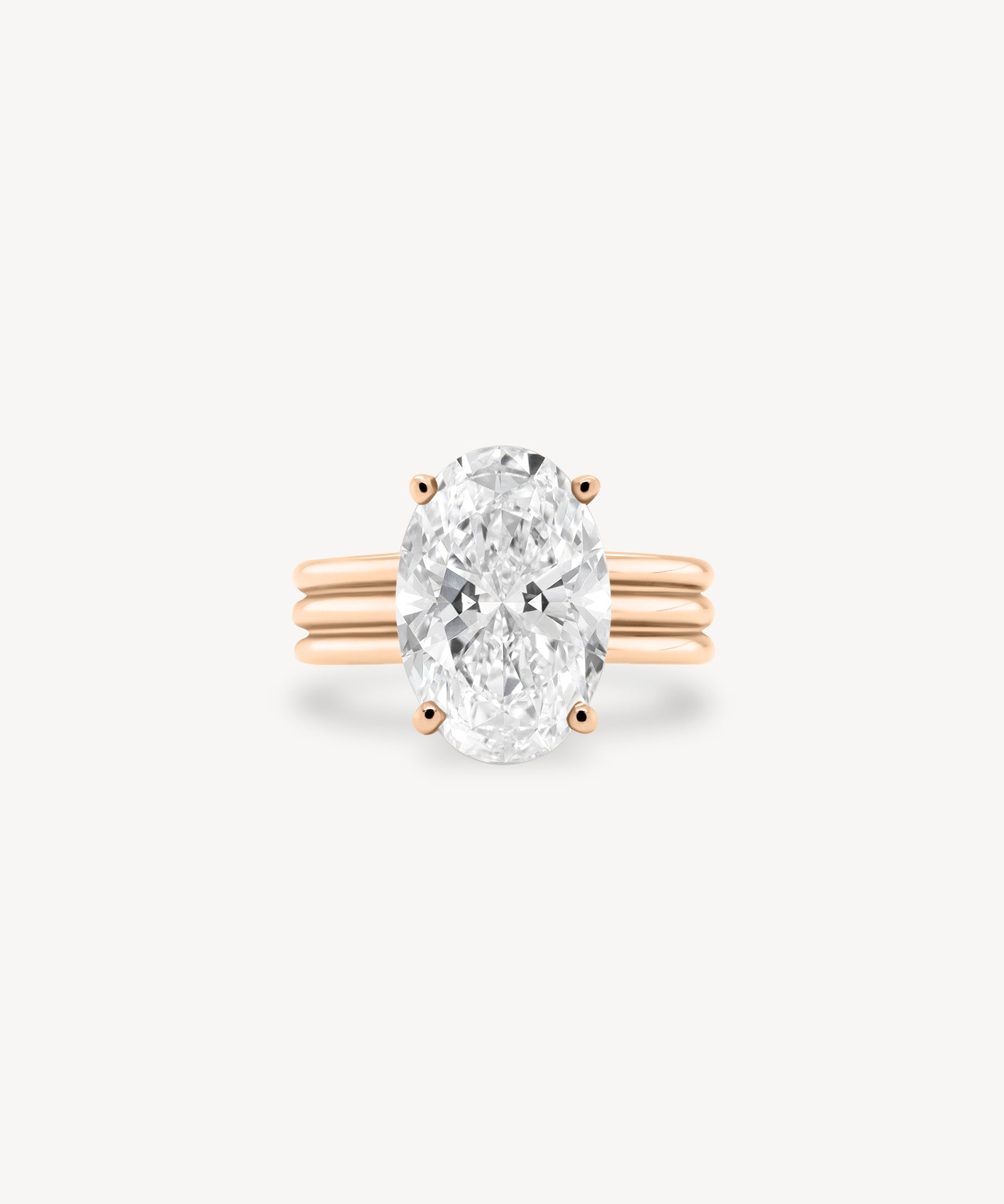 Oval Cut Diamond Triple-Ribbed Solitaire Ring