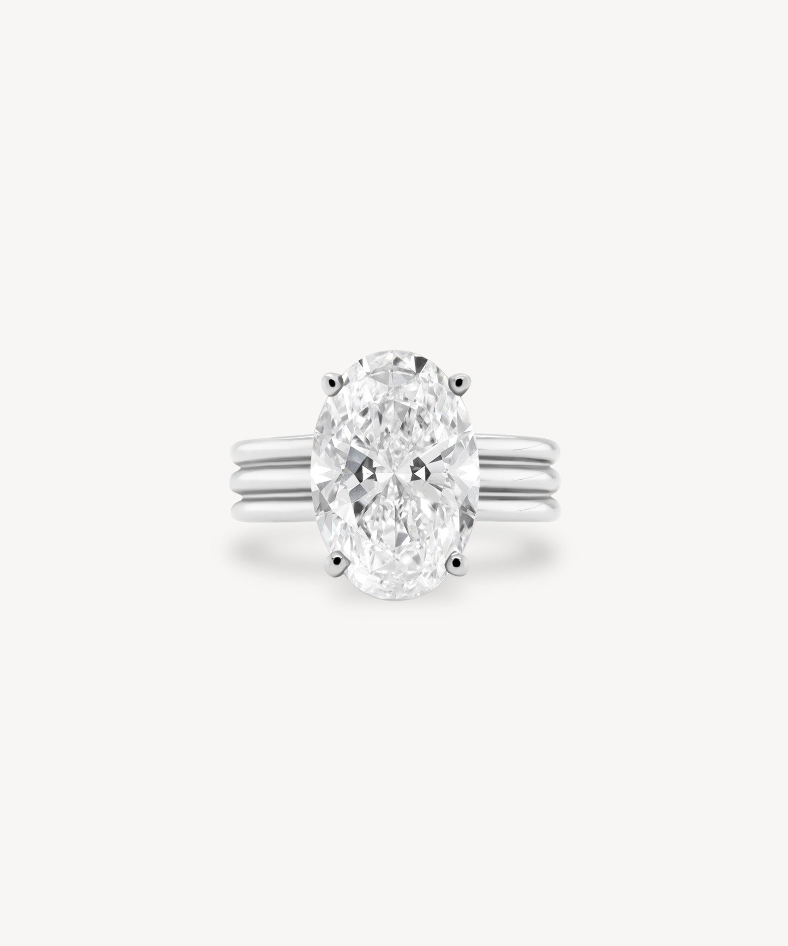 Oval Cut Diamond Triple-Ribbed Solitaire Ring