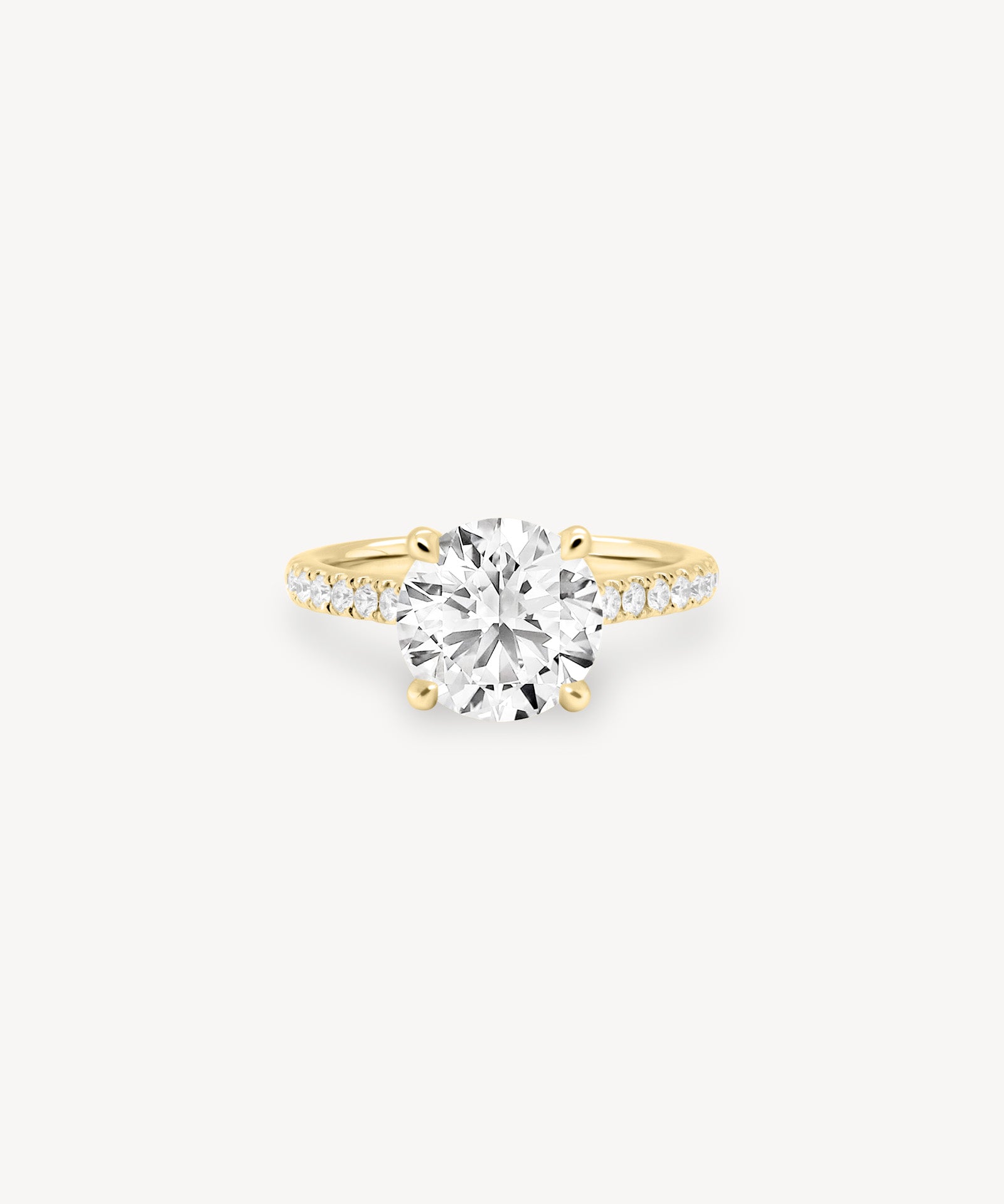 Round Cut Diamond Pavé Ring in Cathedral Setting with Hidden Halo