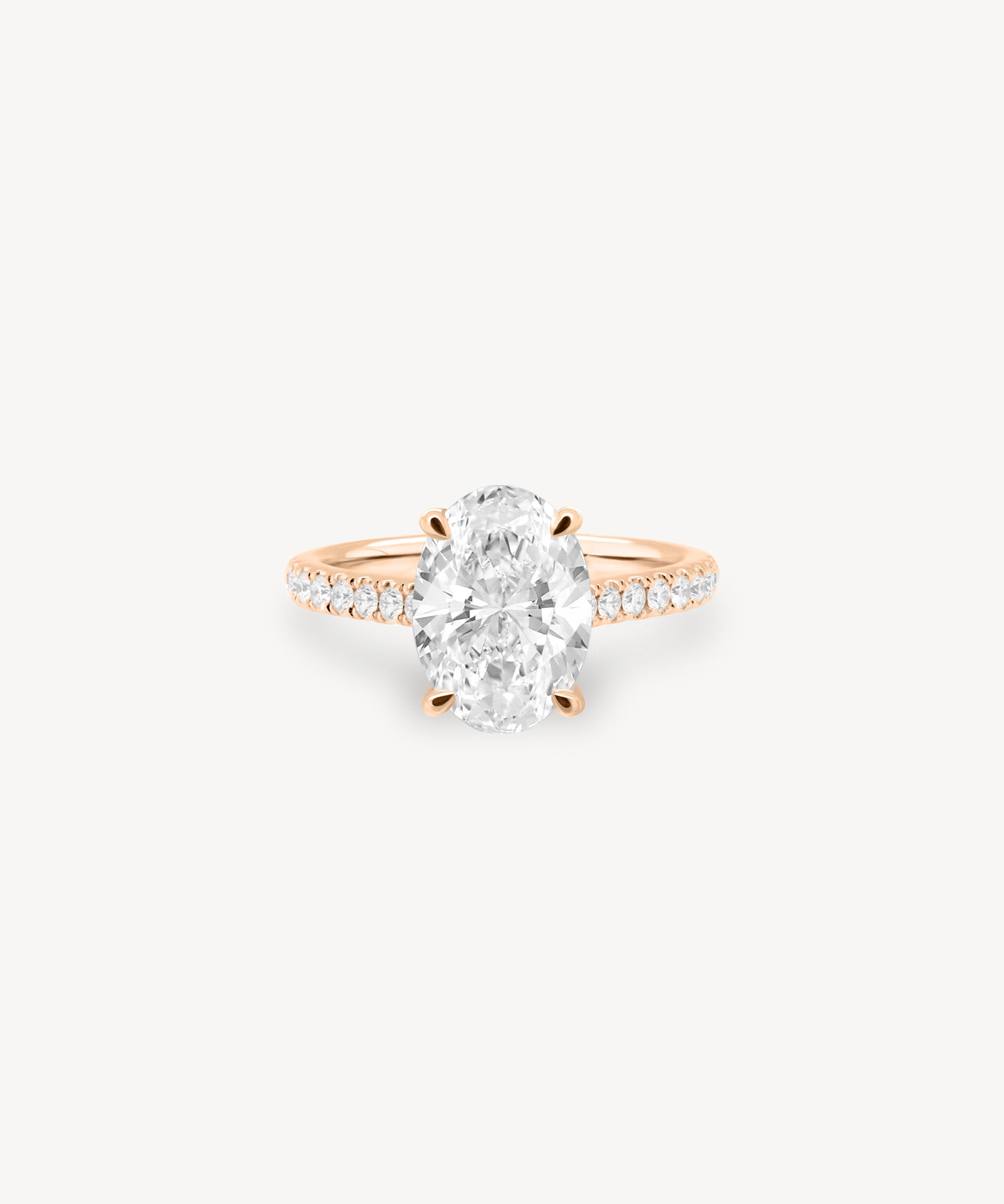 Oval Cut Diamond Pavé Ring in Cathedral Setting with Hidden Halo