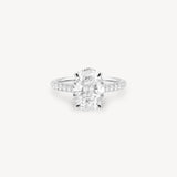 Oval Cut Diamond Pavé Ring in Cathedral Setting with Hidden Halo