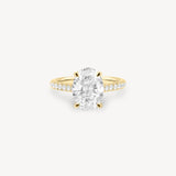 Oval Cut Diamond Pavé Ring in Cathedral Setting with Hidden Halo