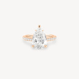 Pear Cut Diamond Pavé Ring in Cathedral Setting with Hidden Halo