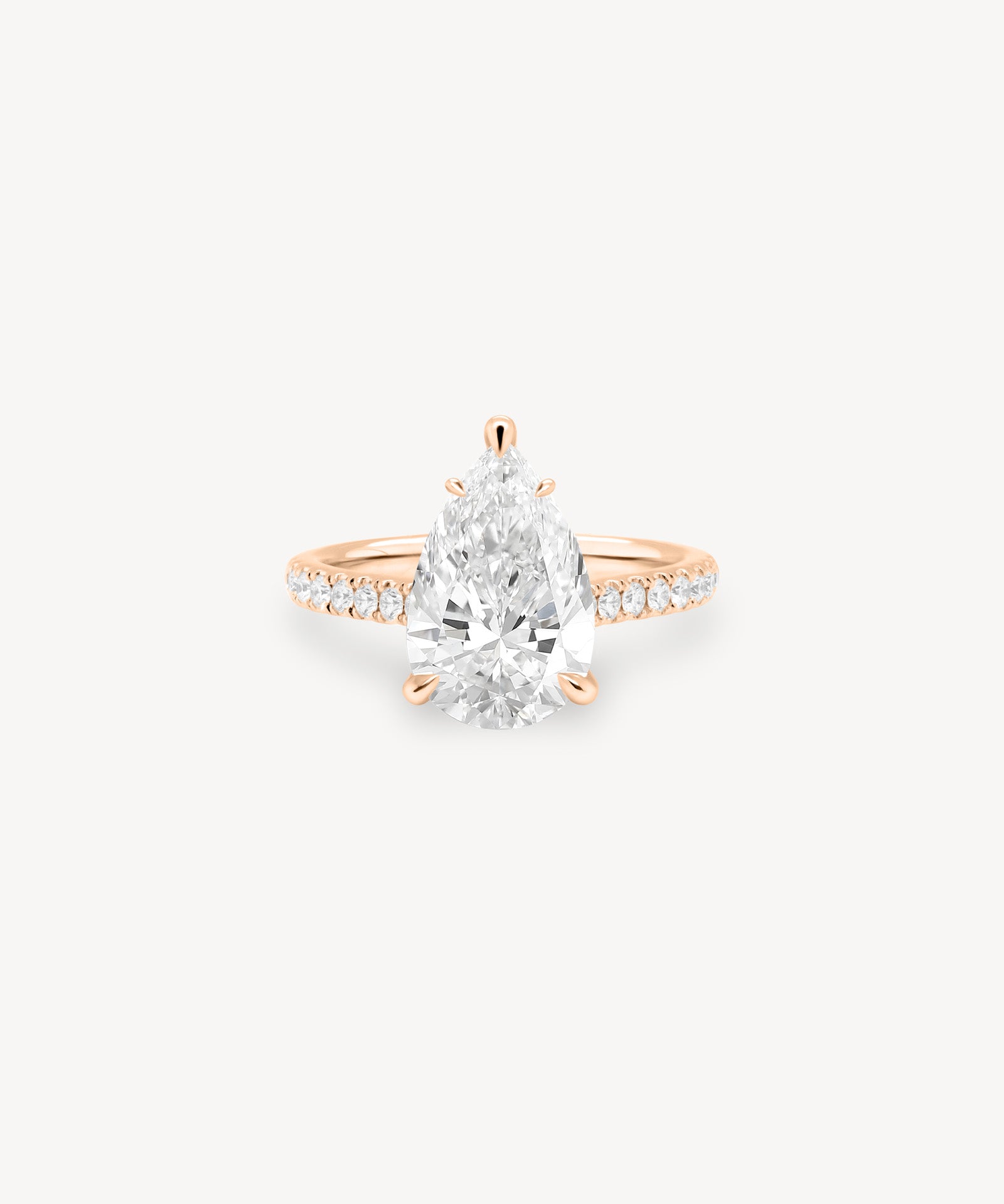 Pear Cut Diamond Pavé Ring in Cathedral Setting with Hidden Halo