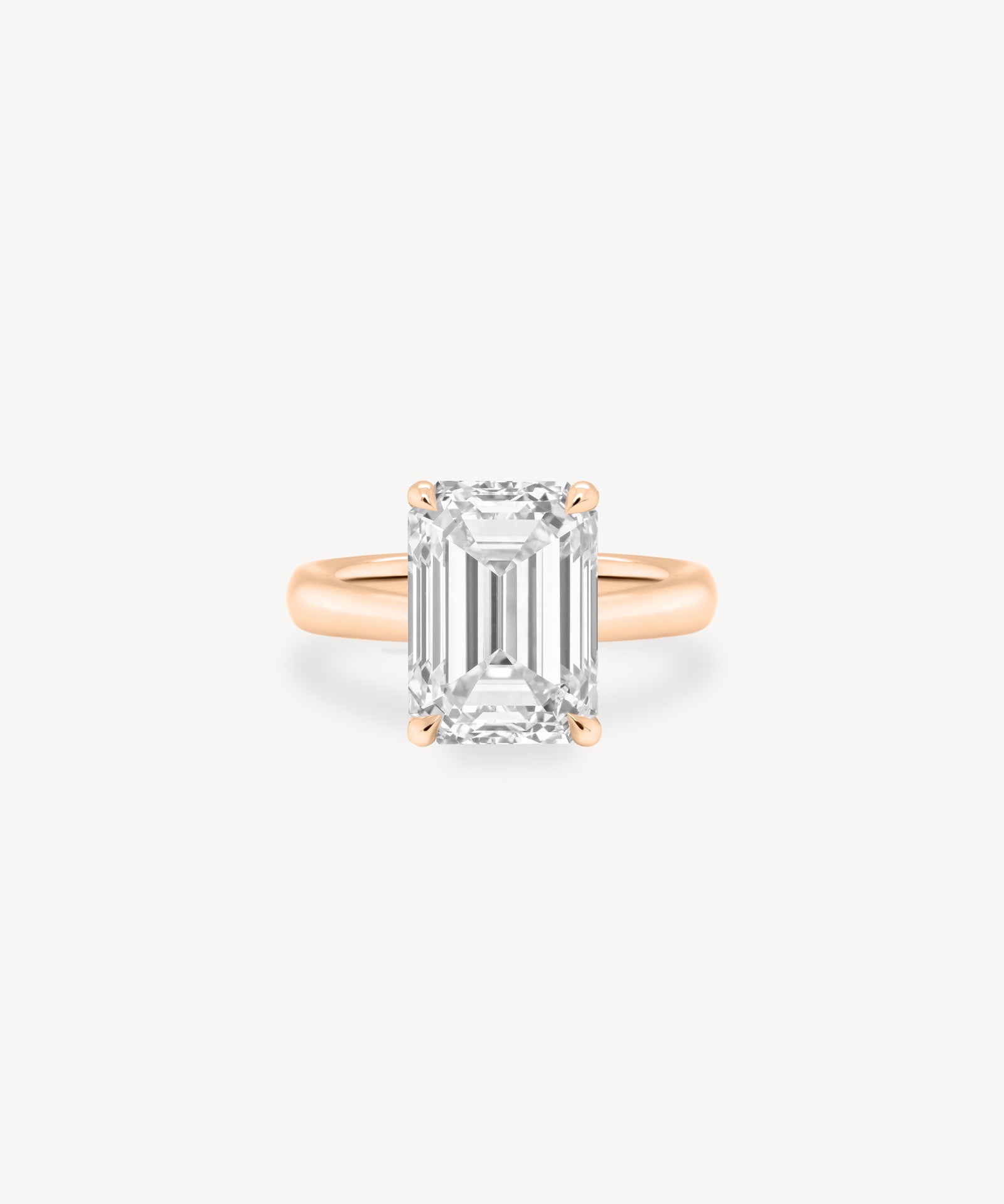 Classic Emerald Cut Diamond Solitaire Ring in Cathedral Setting