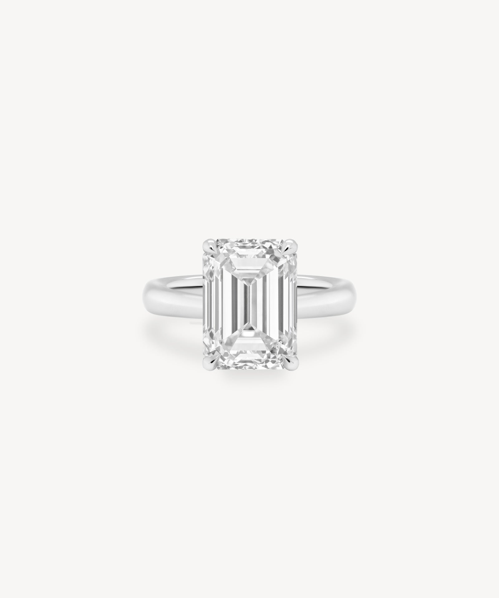 Classic Emerald Cut Diamond Solitaire Ring in Cathedral Setting