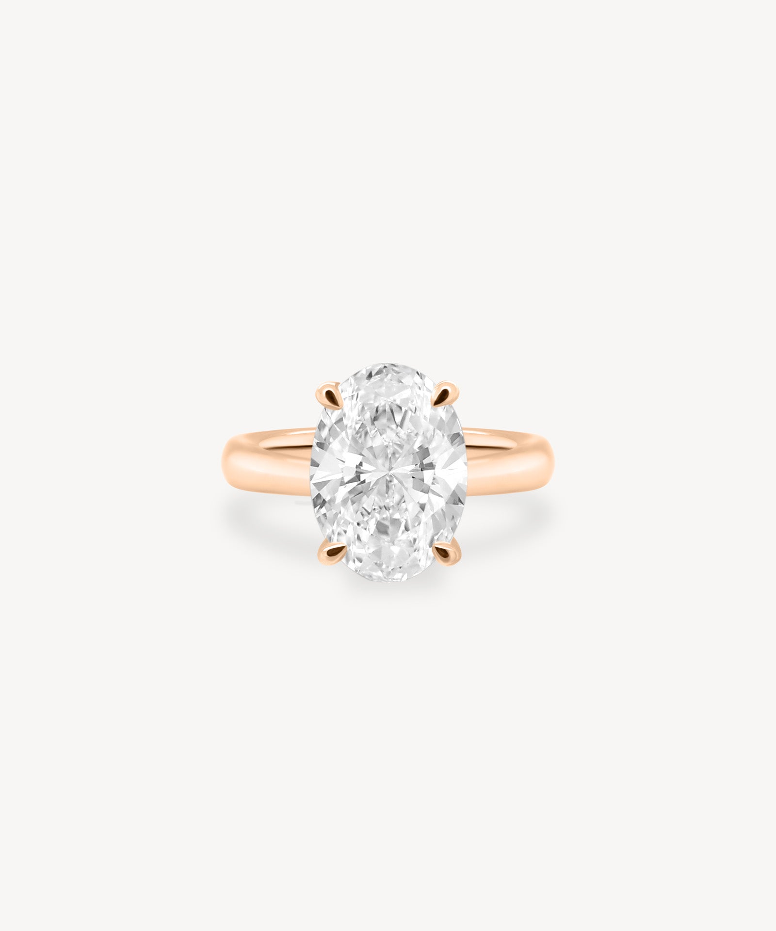 Classic Oval Cut Diamond Solitaire Ring in Cathedral Setting