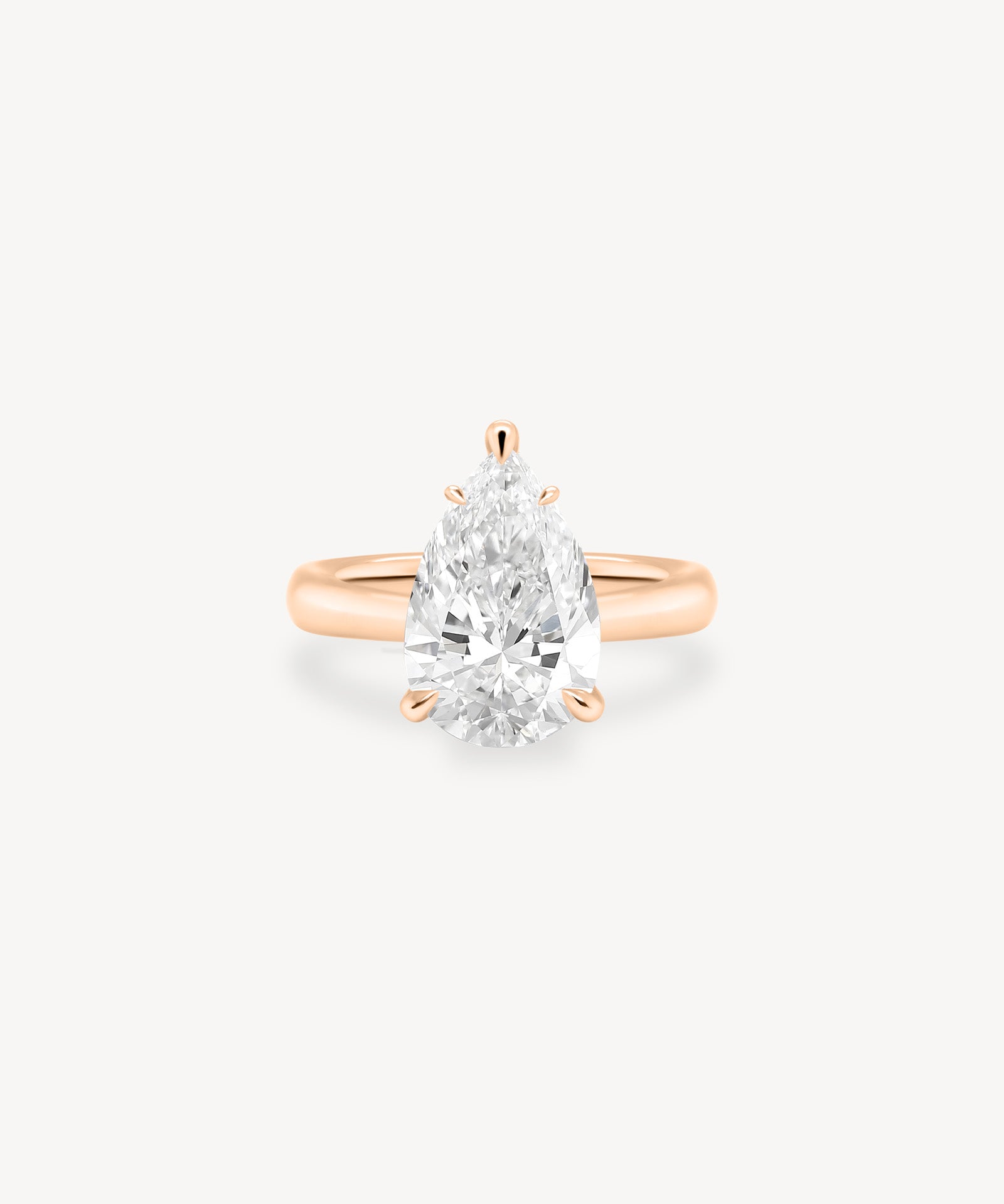 Classic Pear Cut Diamond Solitaire Ring in Cathedral Setting