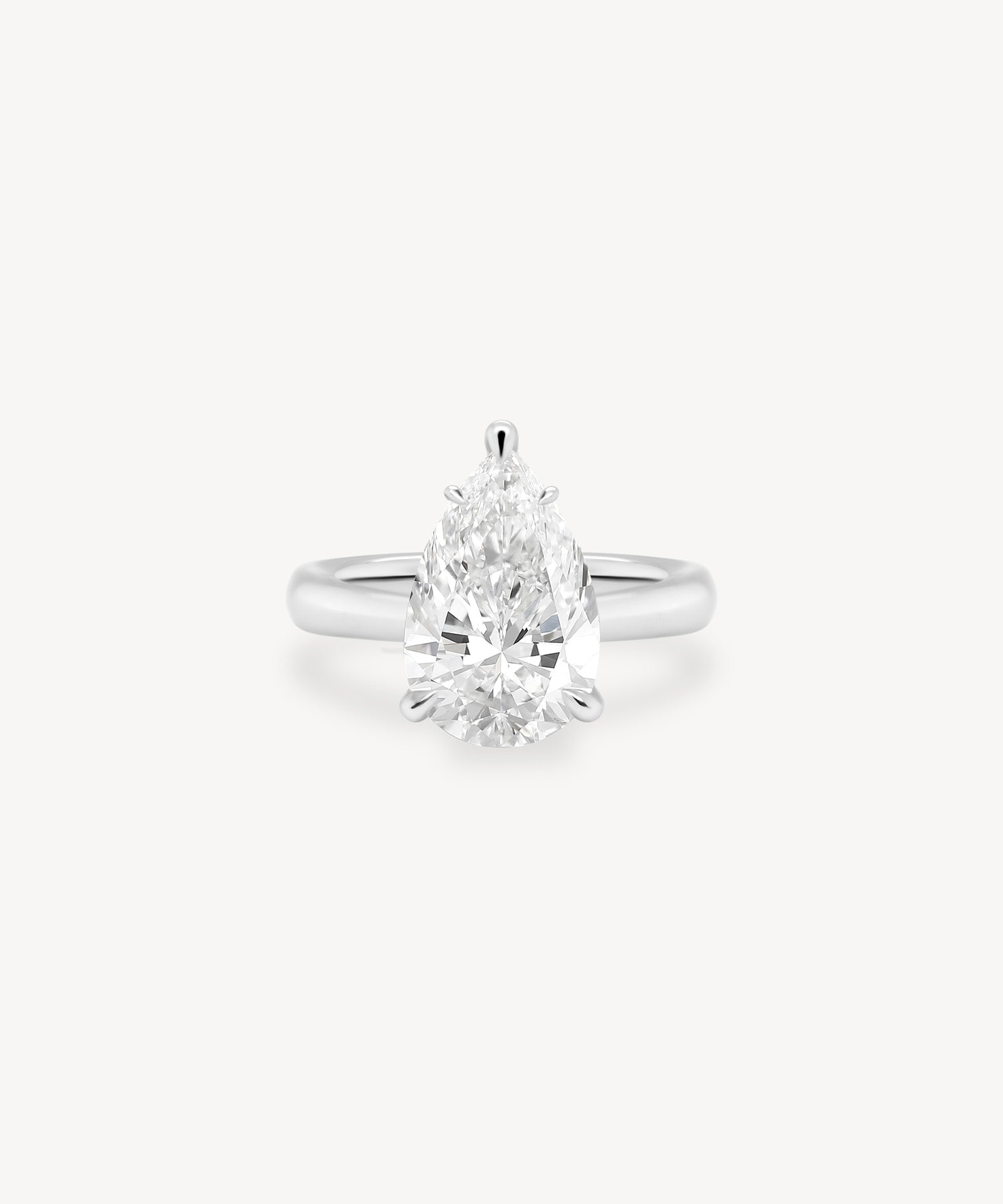 Classic Pear Cut Diamond Solitaire Ring in Cathedral Setting