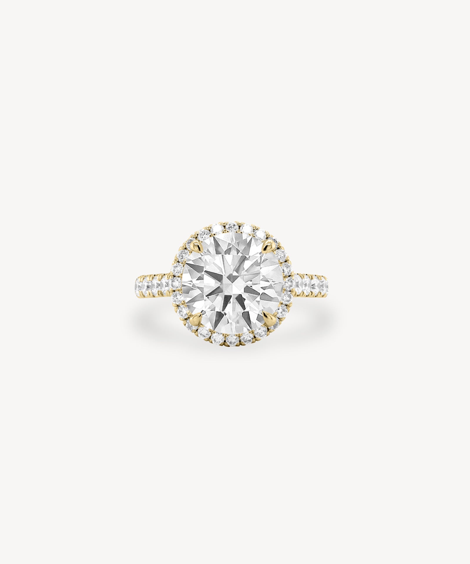 Round Cut Diamond Halo Pavé Ring In Cathedral Setting