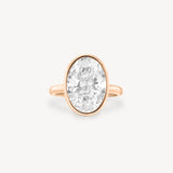 Oval Cut Diamond Solitaire Bezel Ring with Hidden Halo