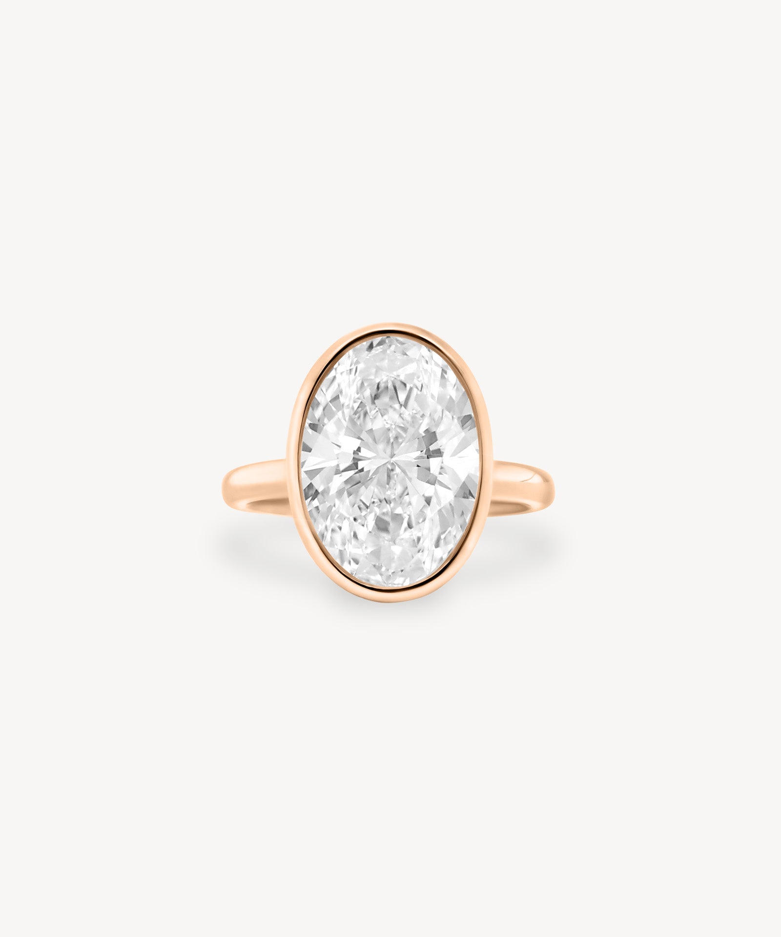 Oval Cut Diamond Solitaire Bezel Ring with Hidden Halo