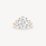 Oval Cut Diamond Ring with Graduated Baguette Side Stones