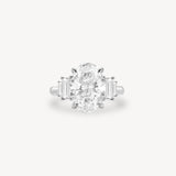 Oval Cut Diamond Ring with Graduated Baguette Side Stones