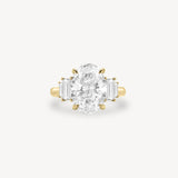 Oval Cut Diamond Ring with Graduated Baguette Side Stones