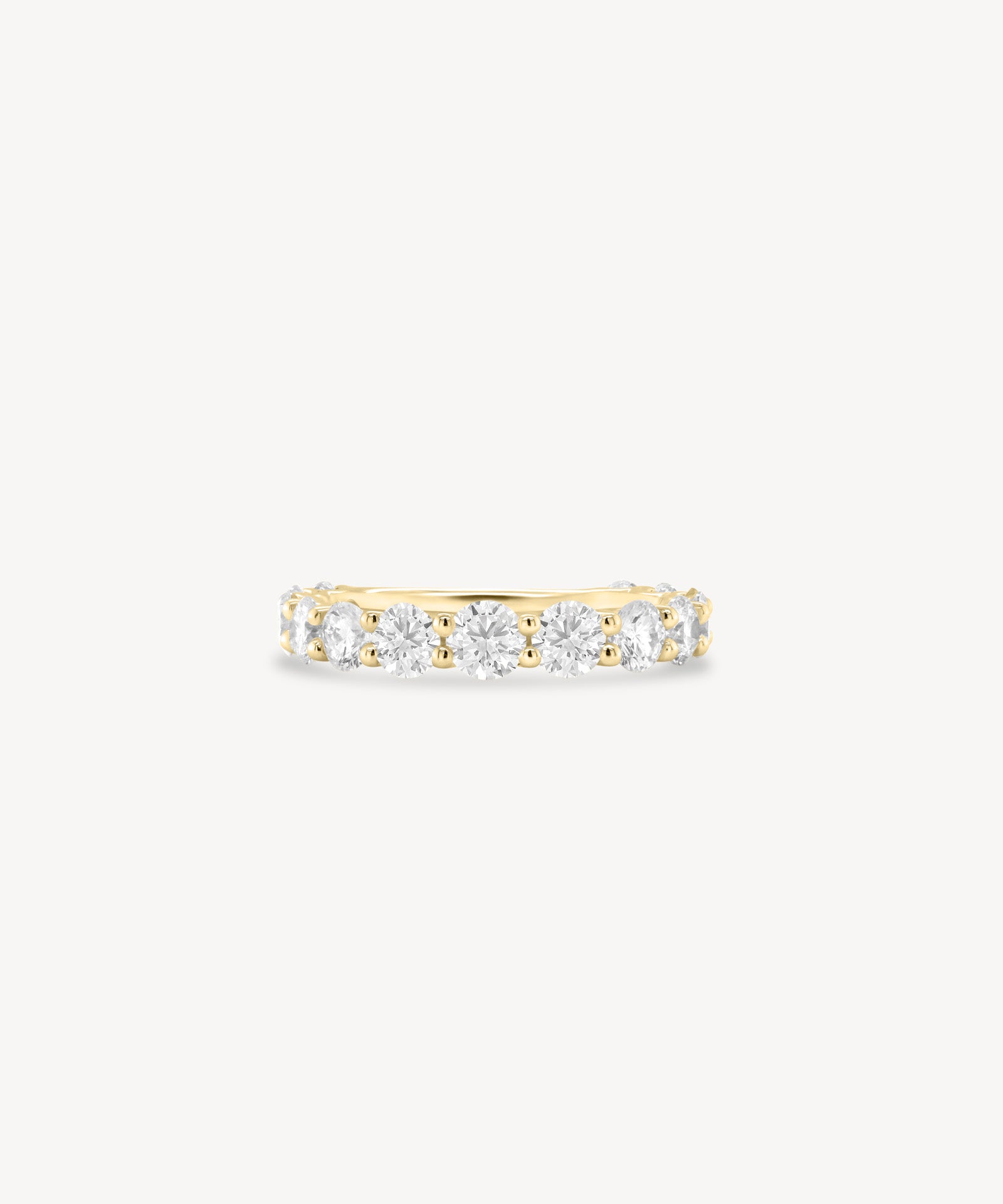 Three quarter diamond eternity ring in yellow gold