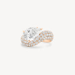 Pear cut diamond wave pavé dome ring in rose gold