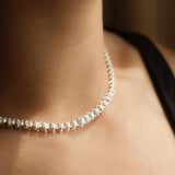 Graduated Round Cut Diamond Tennis Necklace in Enlargement Setting