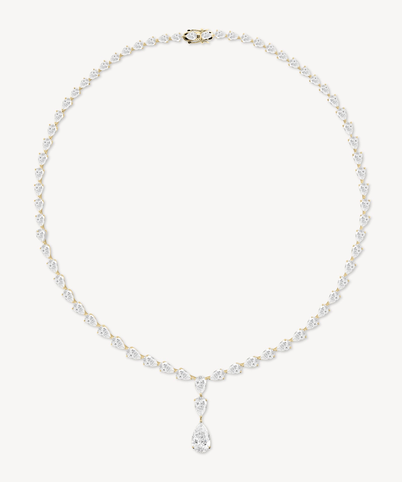 Graduated pear drop diamond necklace in yellow gold