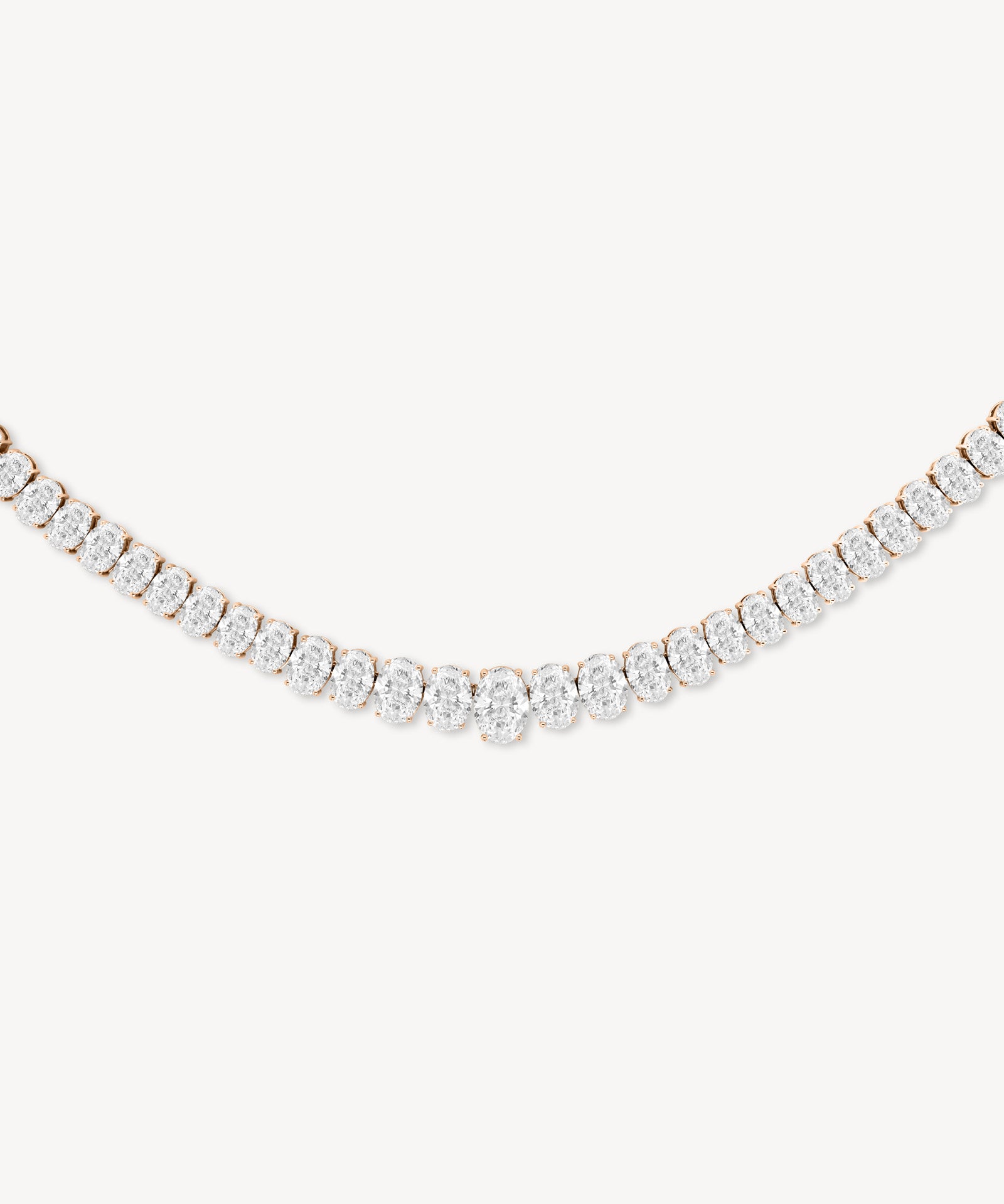 Graduated oval cut diamond tennis necklace in rose gold