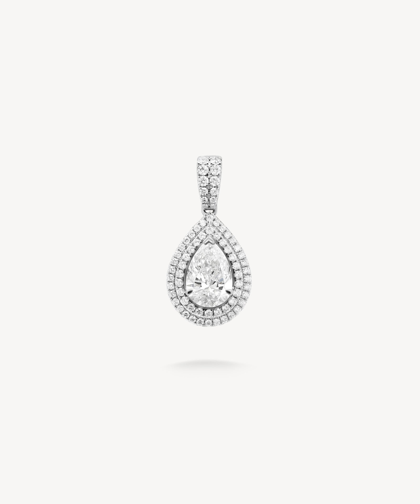 Pear cut diamond double halo pendant in white gold