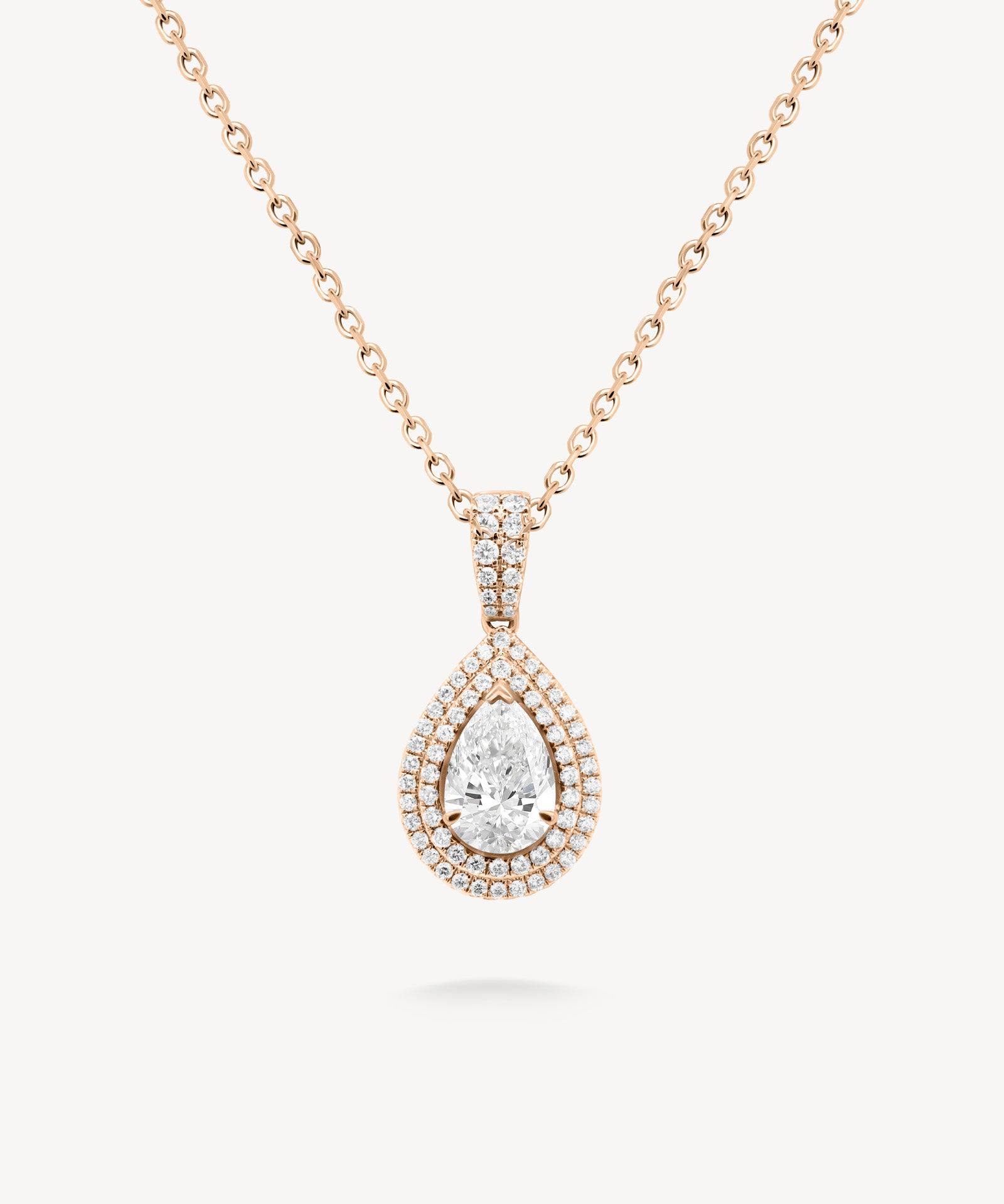 Pear cut diamond double halo pendant necklace in rose gold