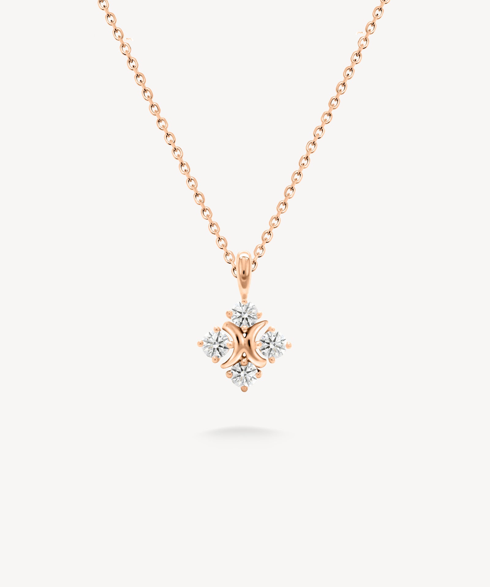XO diamond pendant necklace in rose gold