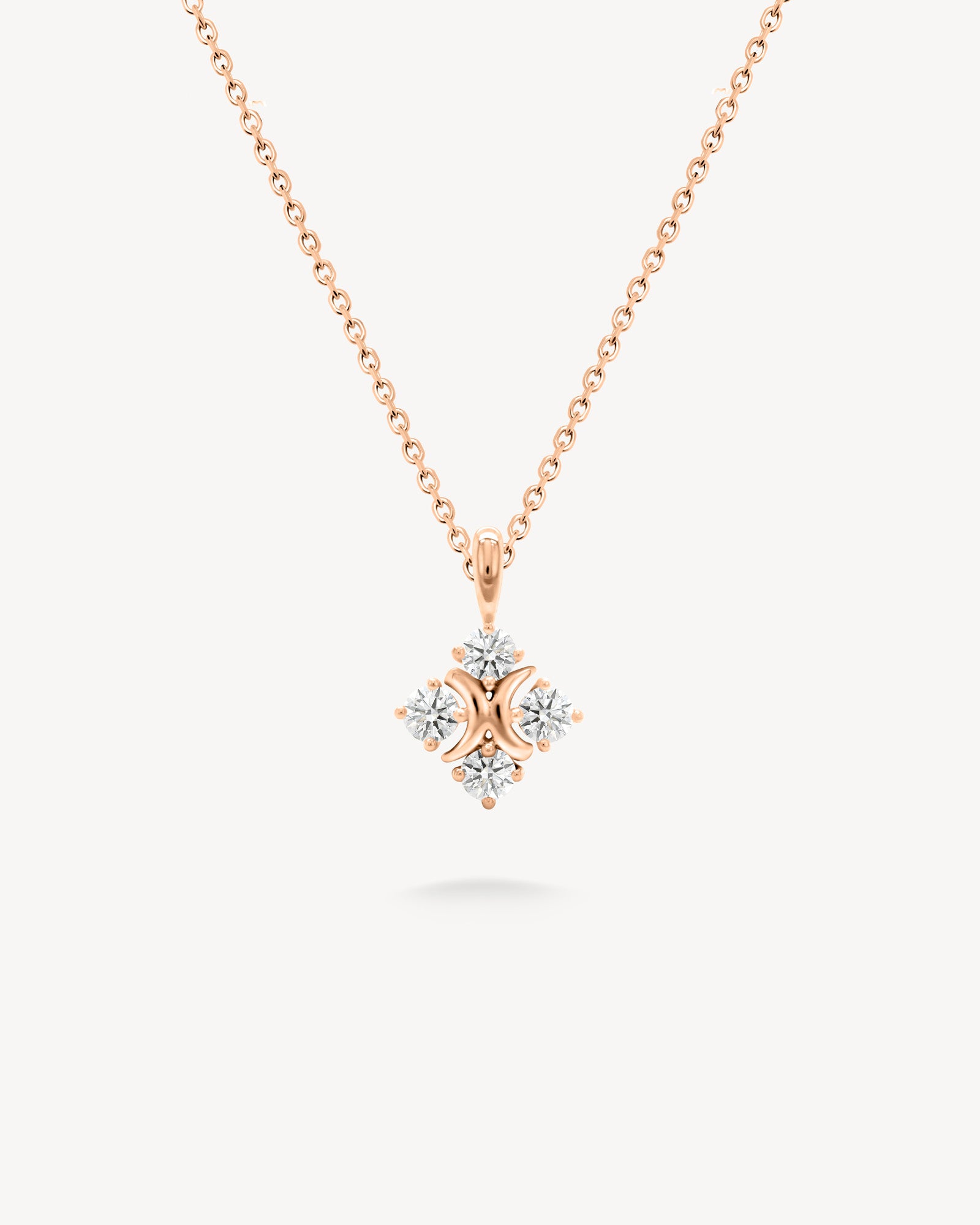 XO diamond pendant necklace in rose gold
