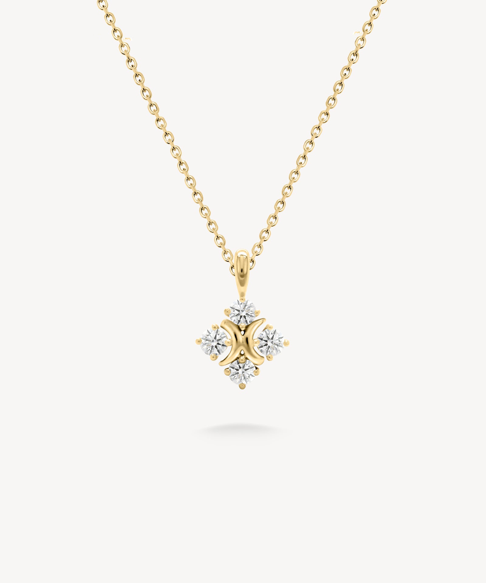 XO diamond pendant necklace in yellow gold