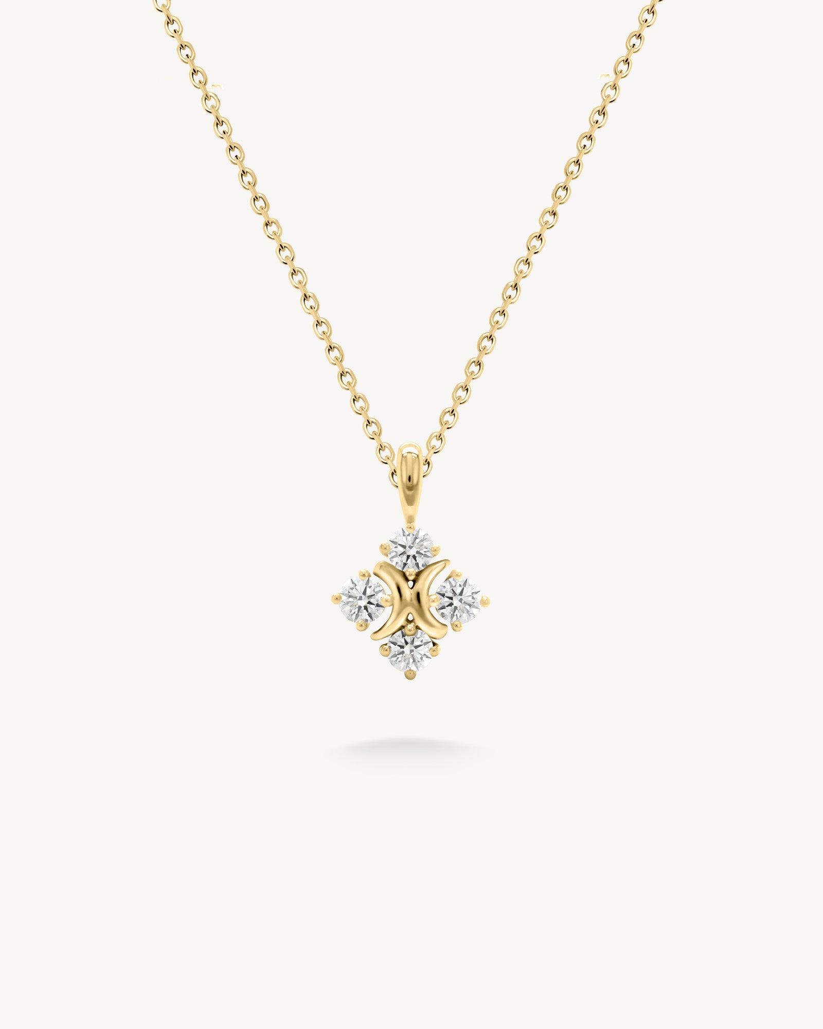 XO diamond pendant necklace in yellow gold