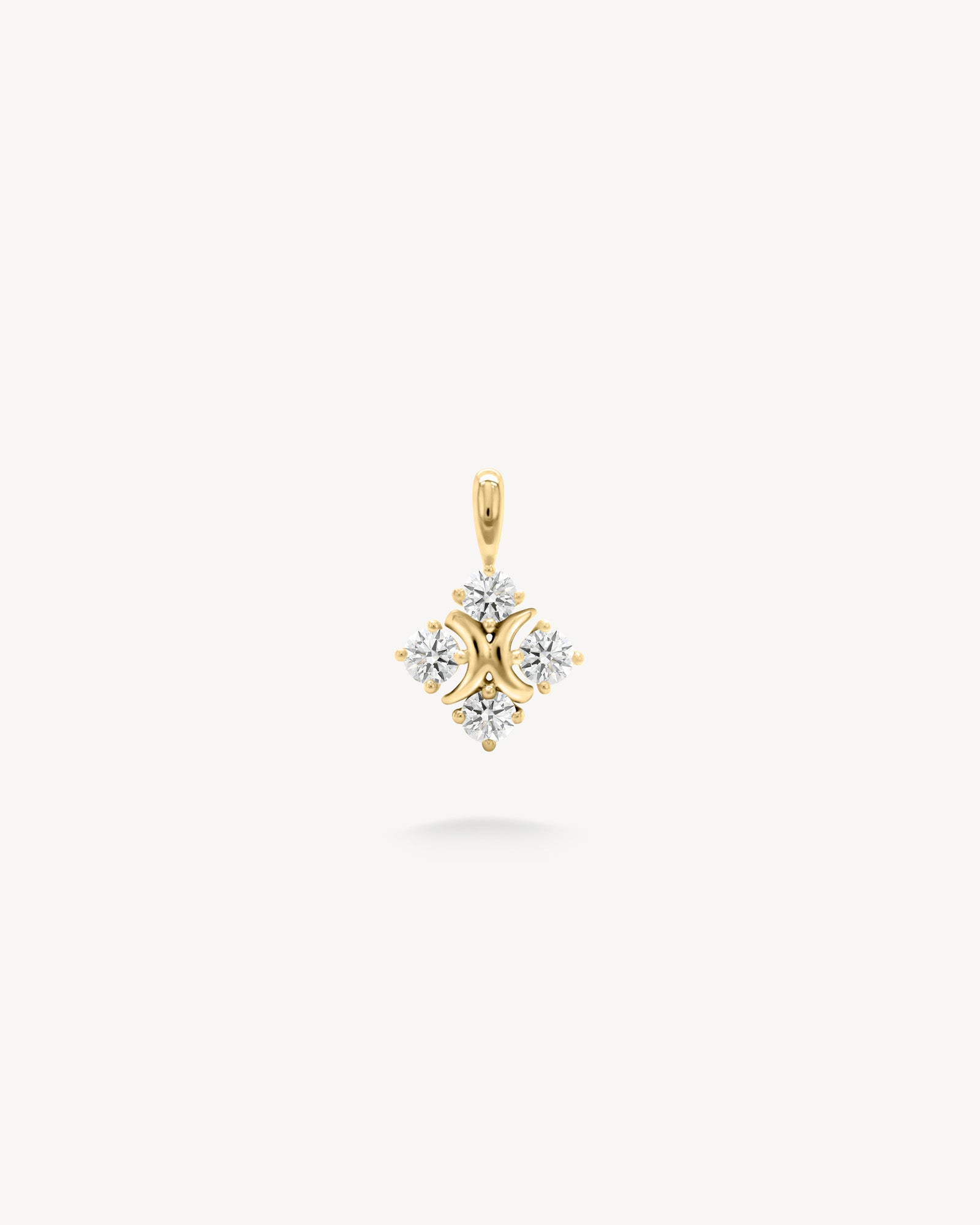 XO diamond pendant in yellow gold