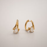 Floating Pear Diamond Huggie Earrings