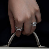 Emerald Cut Diamond Three Stone Ring With Trapezoid Cut Side Stones