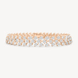Round cut diamond vine tennis bracelet in rose gold