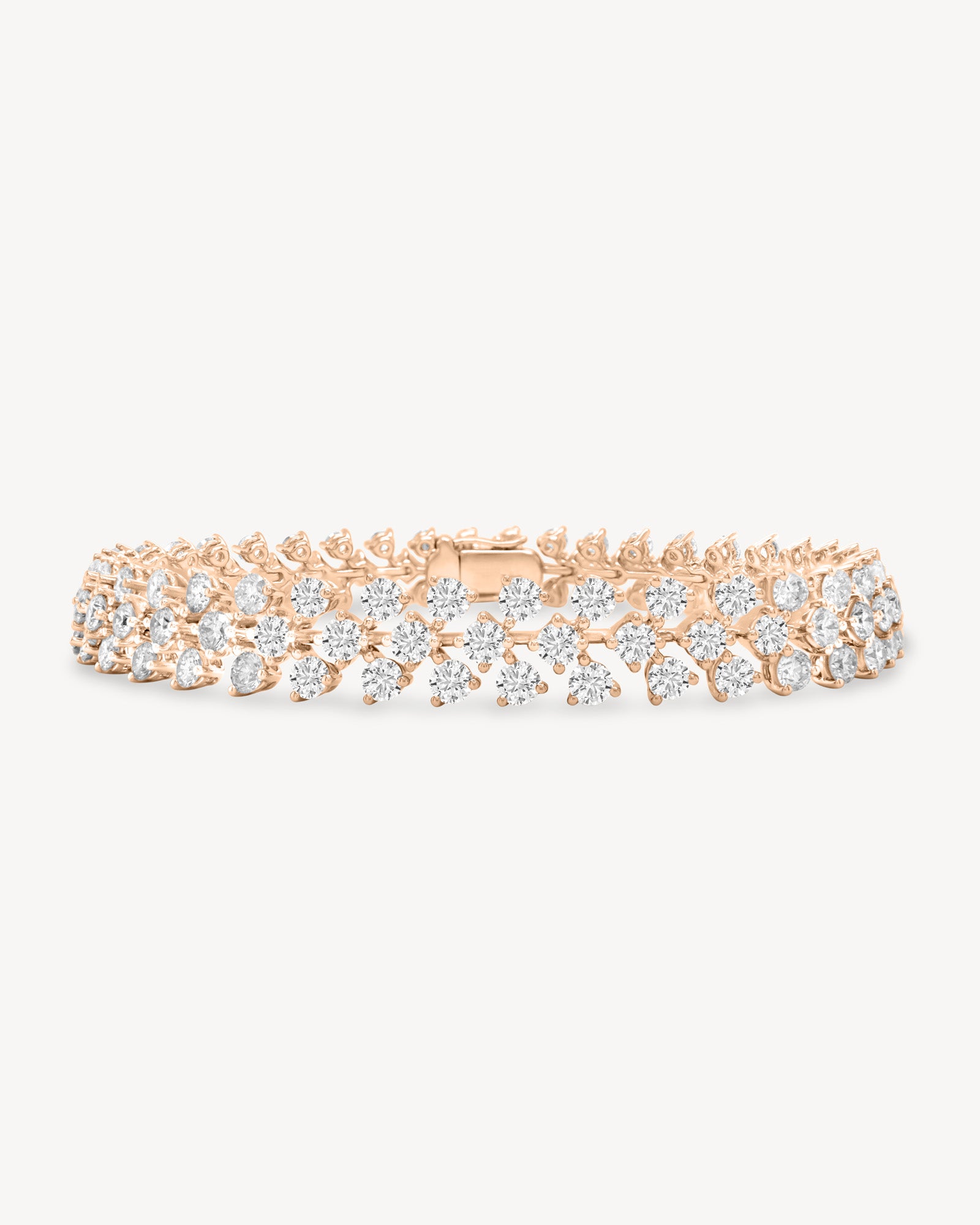 Round cut diamond vine tennis bracelet in rose gold
