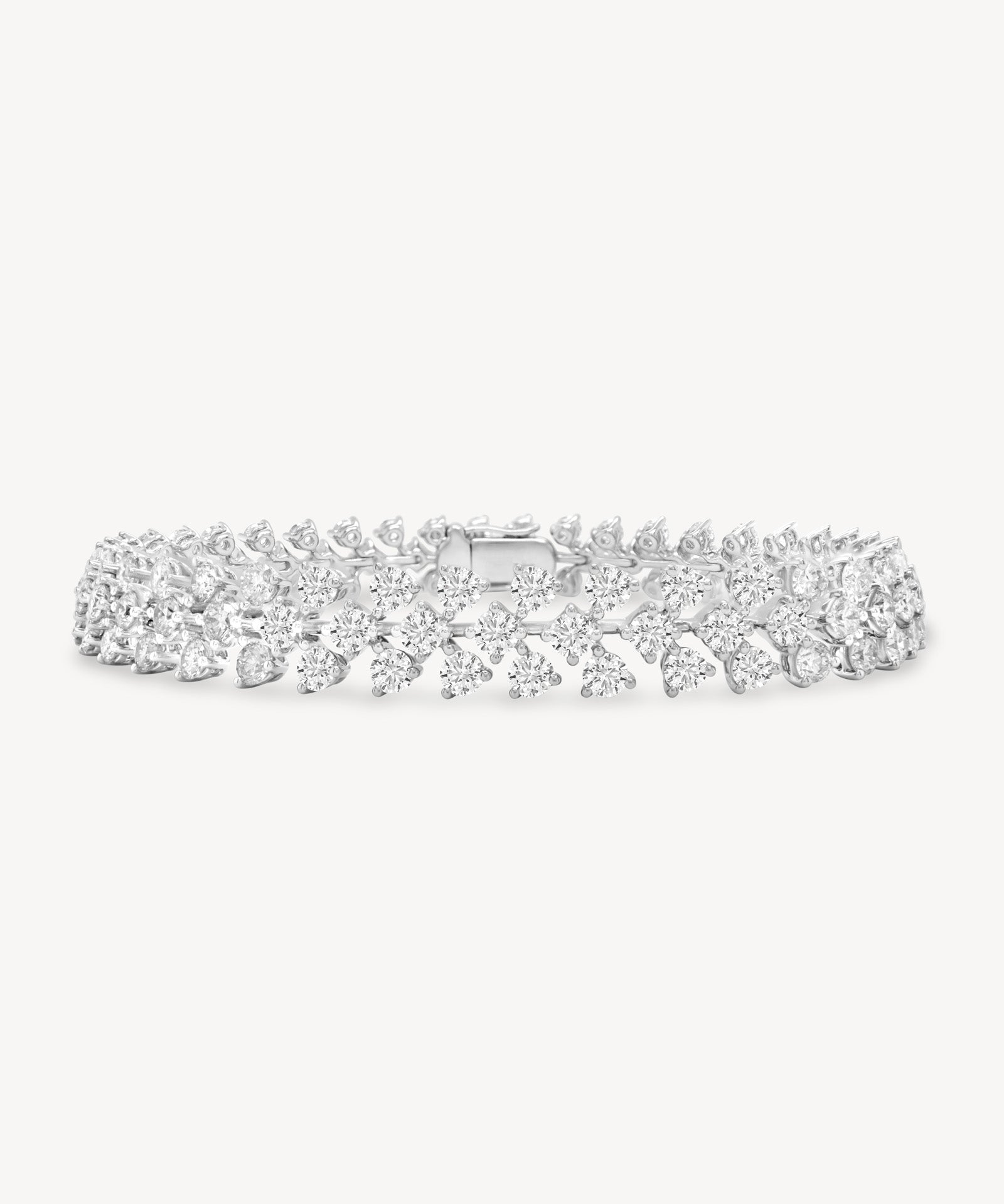 Round cut diamond vine tennis bracelet in white gold