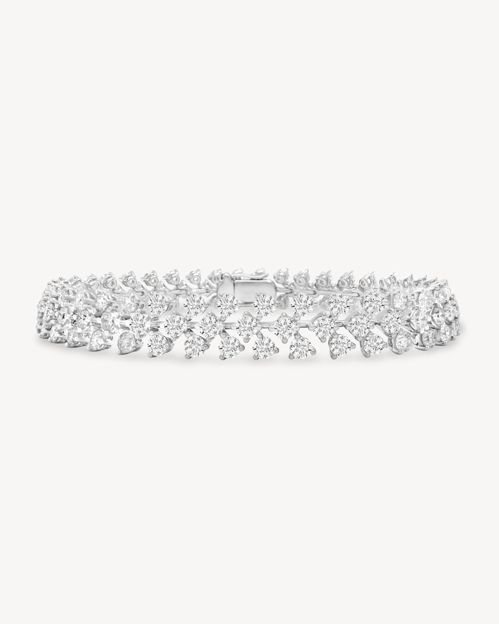 Round cut diamond vine tennis bracelet in white gold