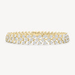 Round cut diamond vine tennis bracelet in yellow gold