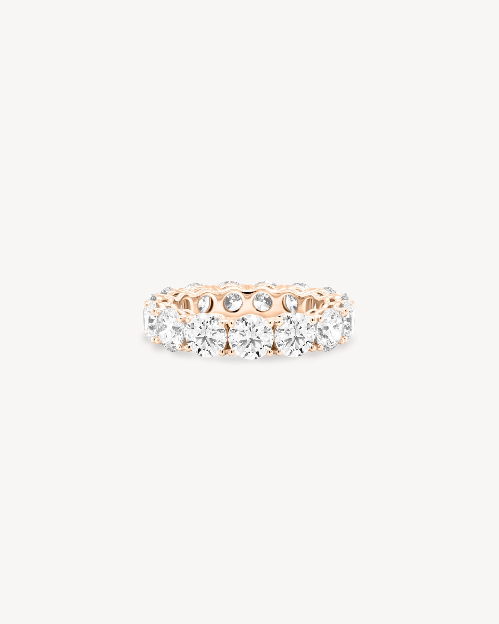 tinxx 18K rose gold lab grown diamond ring on a white background
