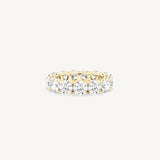 tinxx 18K yellow gold lab grown diamond ring on a white background
