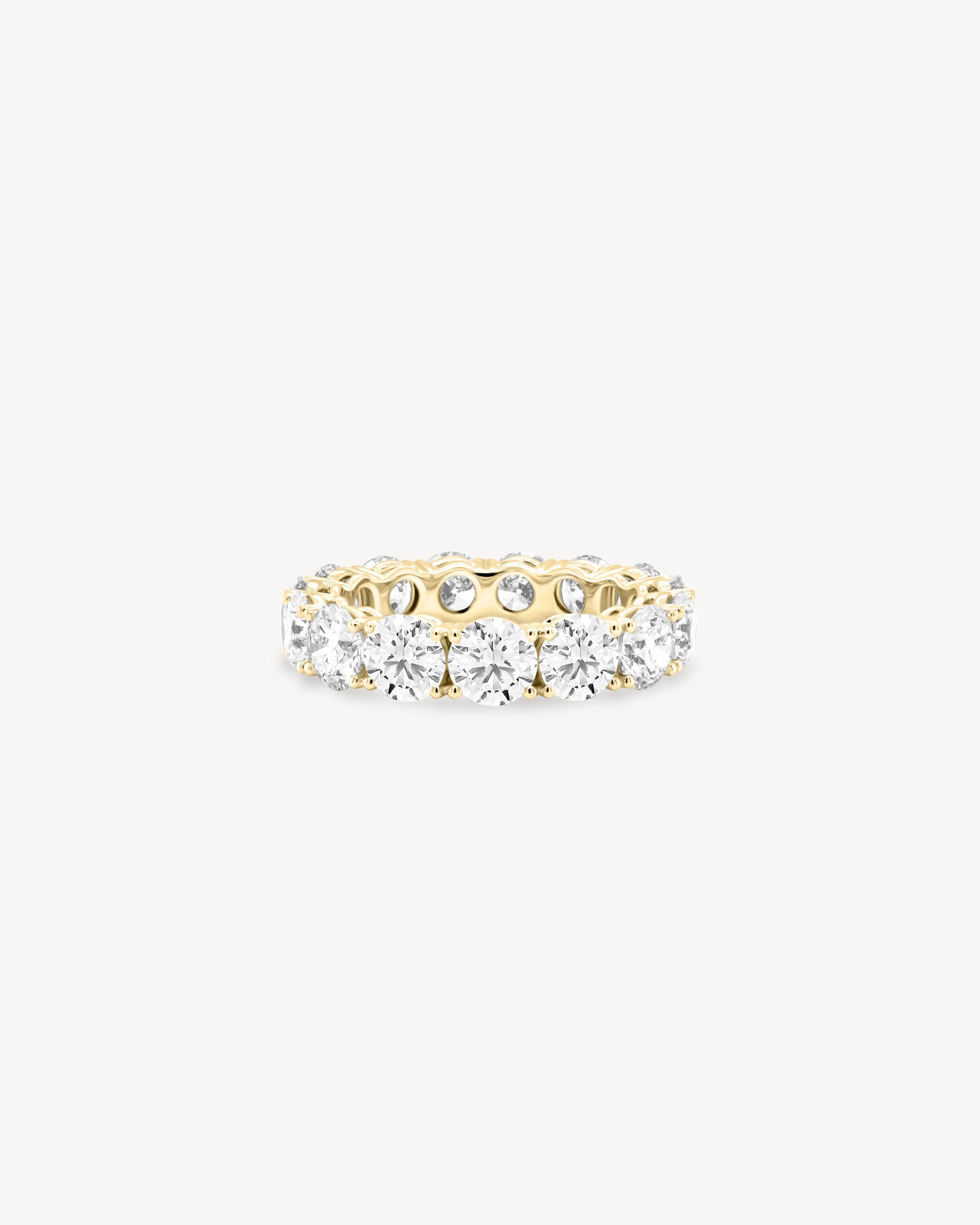tinxx 18K yellow gold lab grown diamond ring on a white background