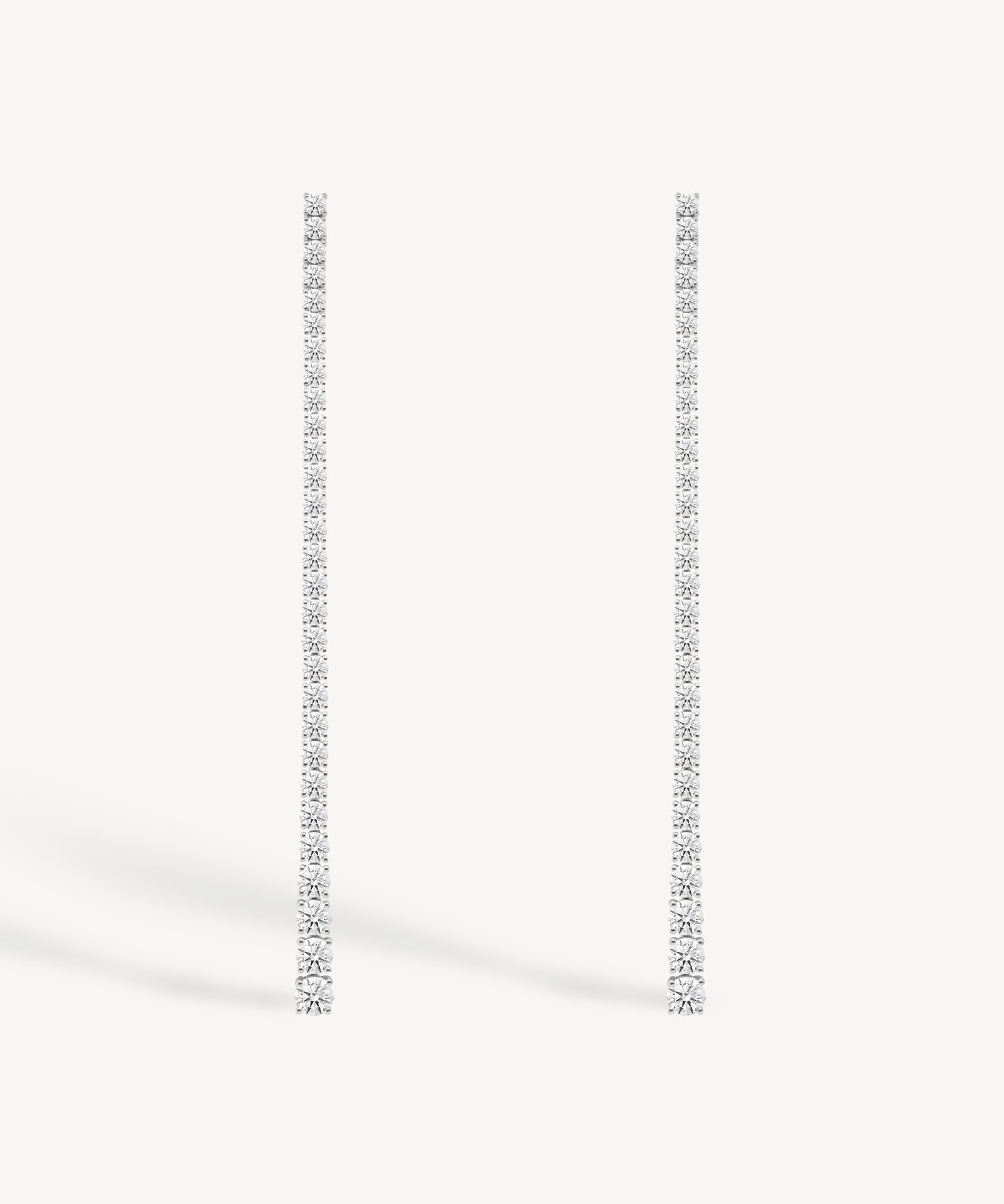 Graduated long drop lab grown diamond earrings in 18K white gold from tinxx.