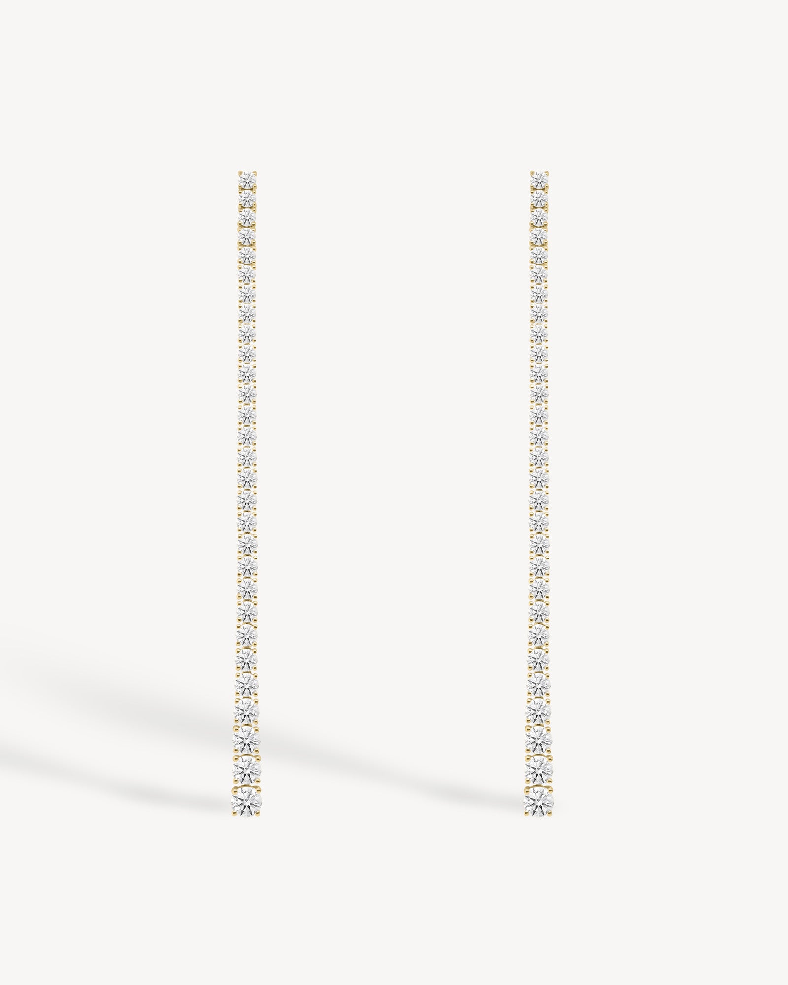 Graduated long drop lab grown diamond earrings in 18K yellow gold from tinxx.
