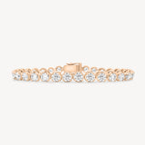Round Cut Diamond Tennis Bracelet in Enlargement Setting