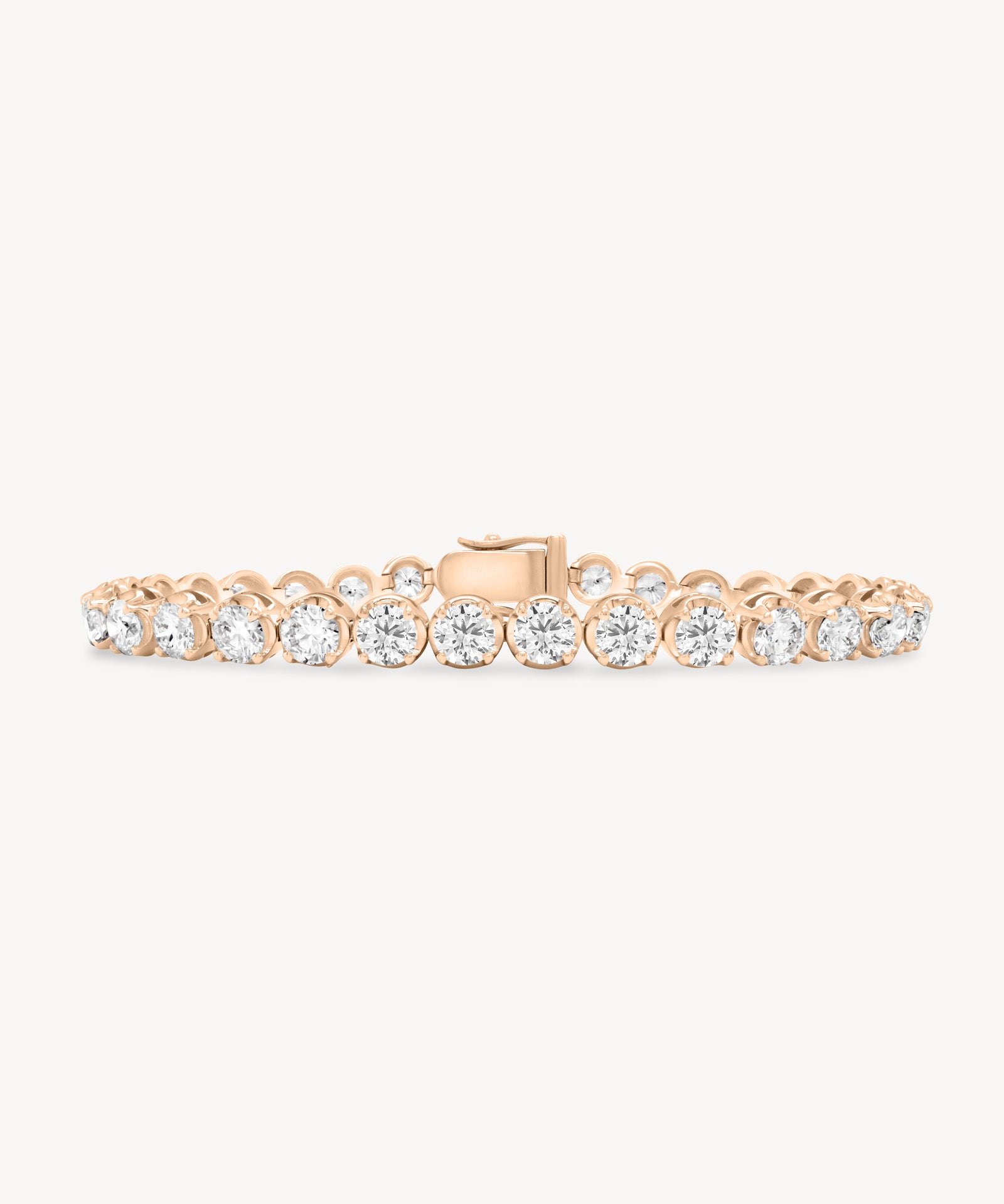 Round Cut Diamond Tennis Bracelet in Enlargement Setting